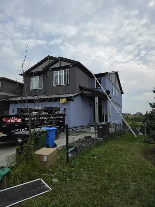 Red Star trailer at a siding project in Calgary