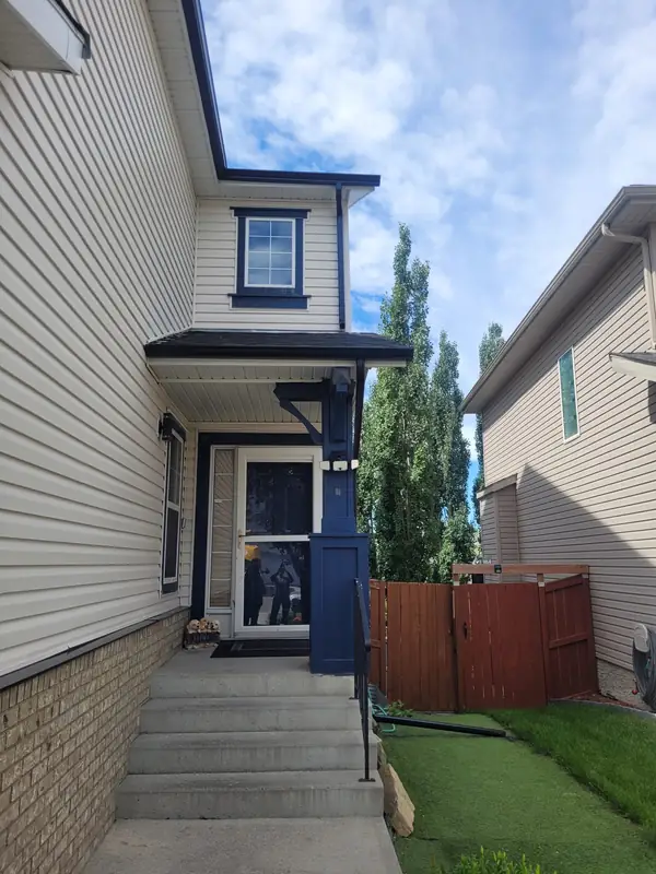 New siding and trim around a front entry